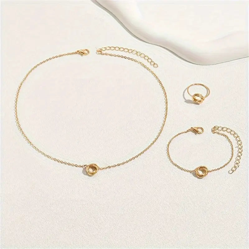 Elegant Gold-Tone Jewelry Set – Twisted Circle Ring, Necklace & Bracelet