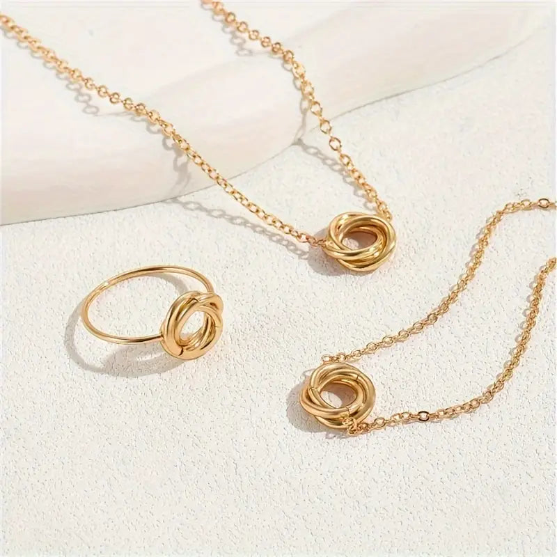 Elegant Gold-Tone Jewelry Set – Twisted Circle Ring, Necklace & Bracelet